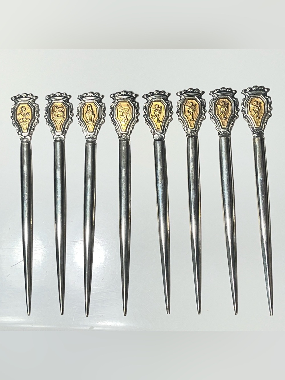 Vintage Silver and Gold-tone Cocktail Picks with Figure/Crest Inlays Set of 8